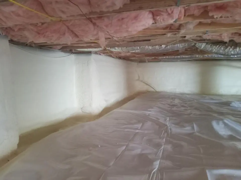 Crawl space encapsulation with closed-cell spray foam for Commercial Roof Restoration in Dickinson